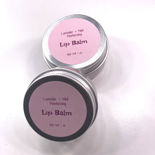 Load image into Gallery viewer, Soothe and protect your lips with our Lavender + Mint Lip Balm! This luxurious lip treatment is packed with moisturizing mango and kokum butters plus a touch of lavender and mint for added protection. Tenderly buttery and calmingly cool, this balm will have your lips feeling hydrated and happy!
